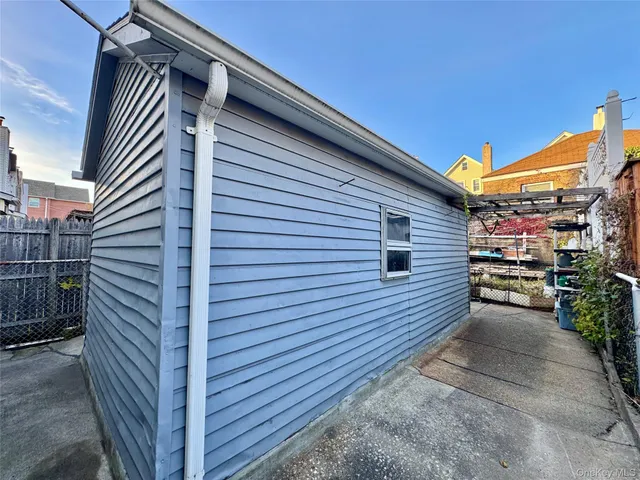 a view of a house with a street
