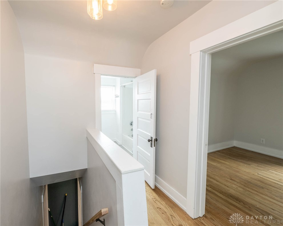 190 Swailes Road Troy, OH 45373 - Photo 24 of 82 This bright hallway connects to a clean bathroom and a versatile room.