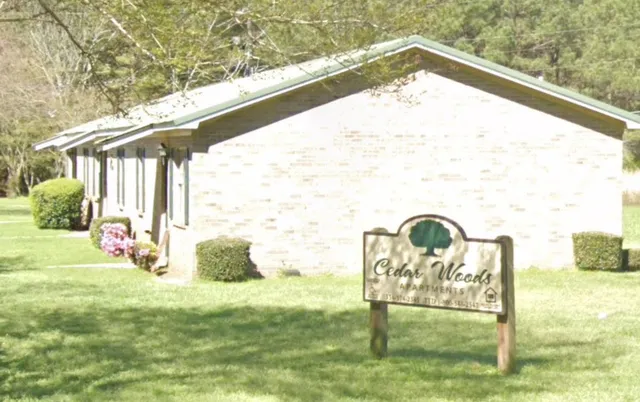 a bench sitting in front of a building