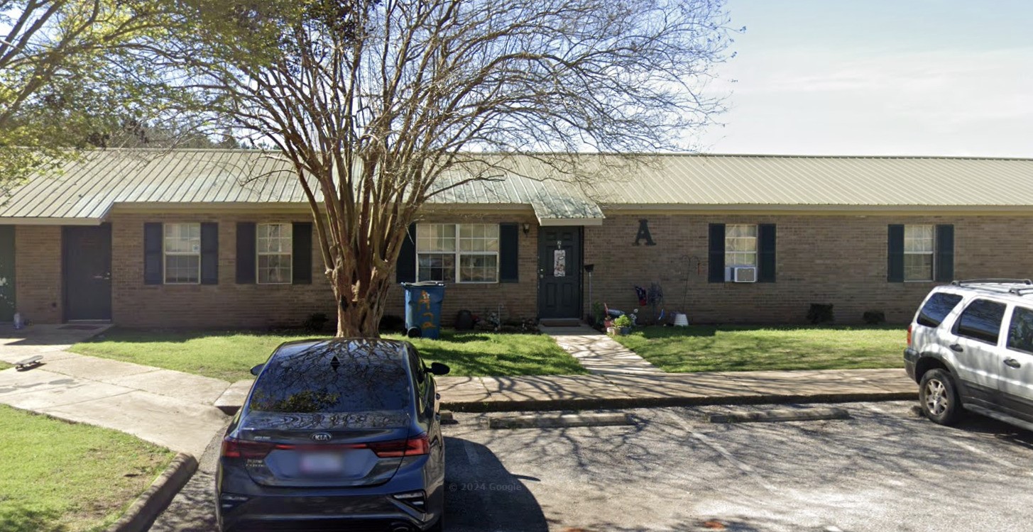 598 Hartley Street Other, AL 36456 - Photo 10 of 13 a front view of a house with garden
