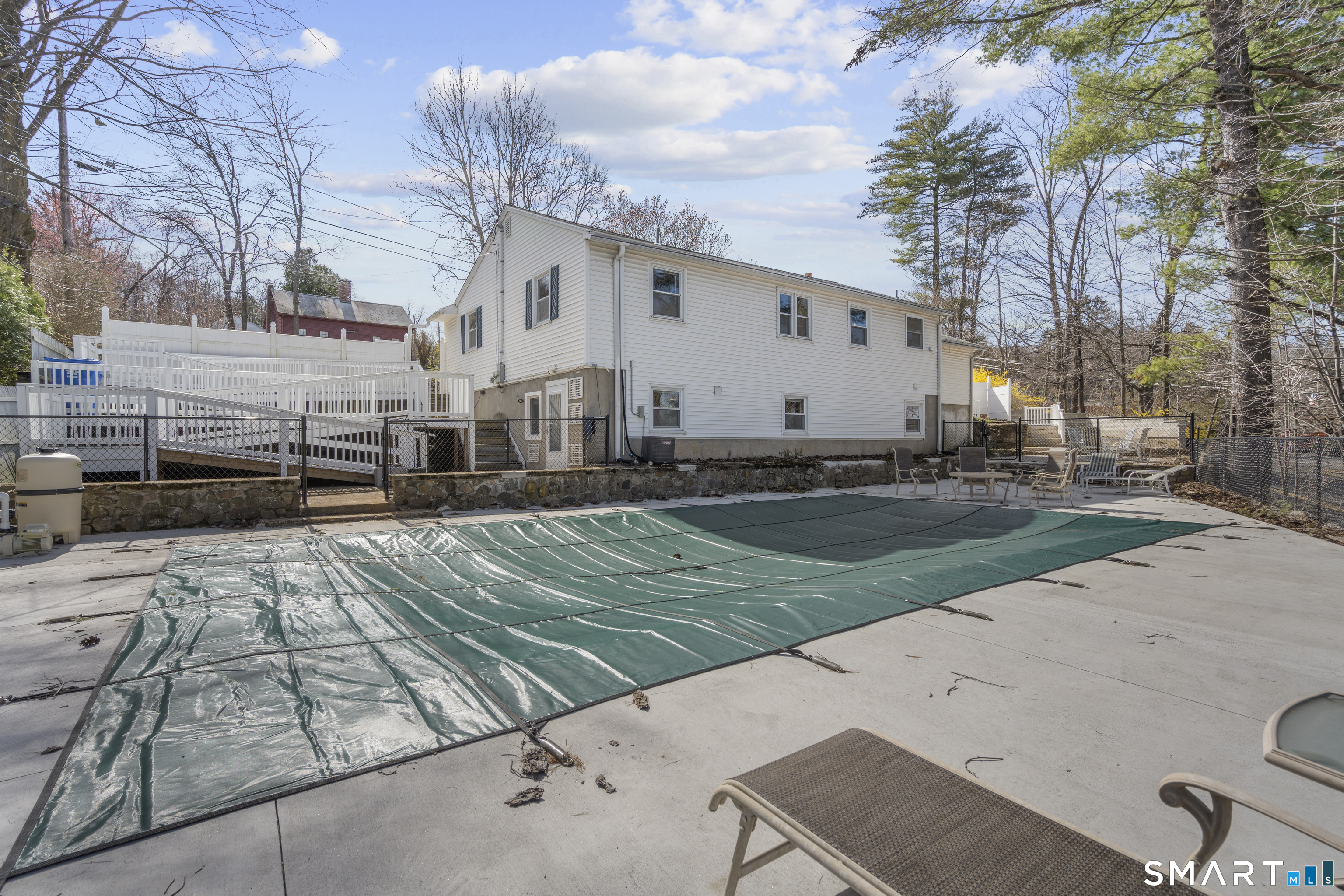 9 Daniel Road, Unit 9B Bristol, CT 06010 - Photo 13 of 16 a view of a white house with a yard