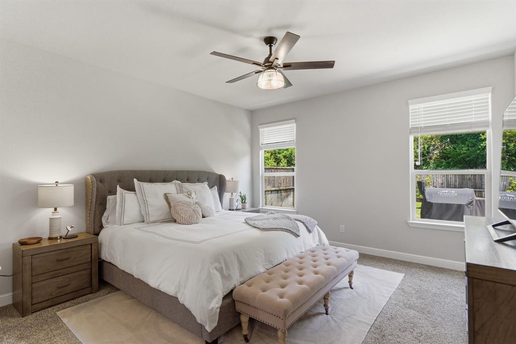 5621 Round Hl Road Denton, TX 76210 - Photo 16 of 27 a bedroom with a bed and window