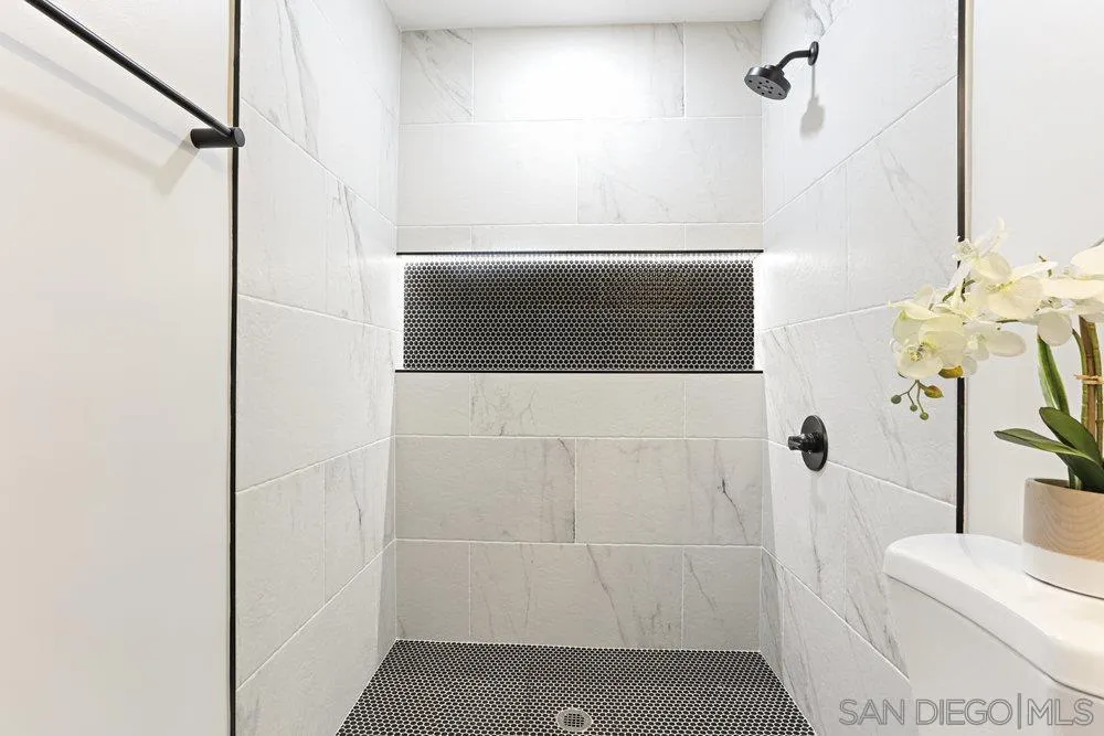 3255 Roberta Lane Oceanside, CA 92054 - Photo 12 of 24 a bathroom with a sink and toilet