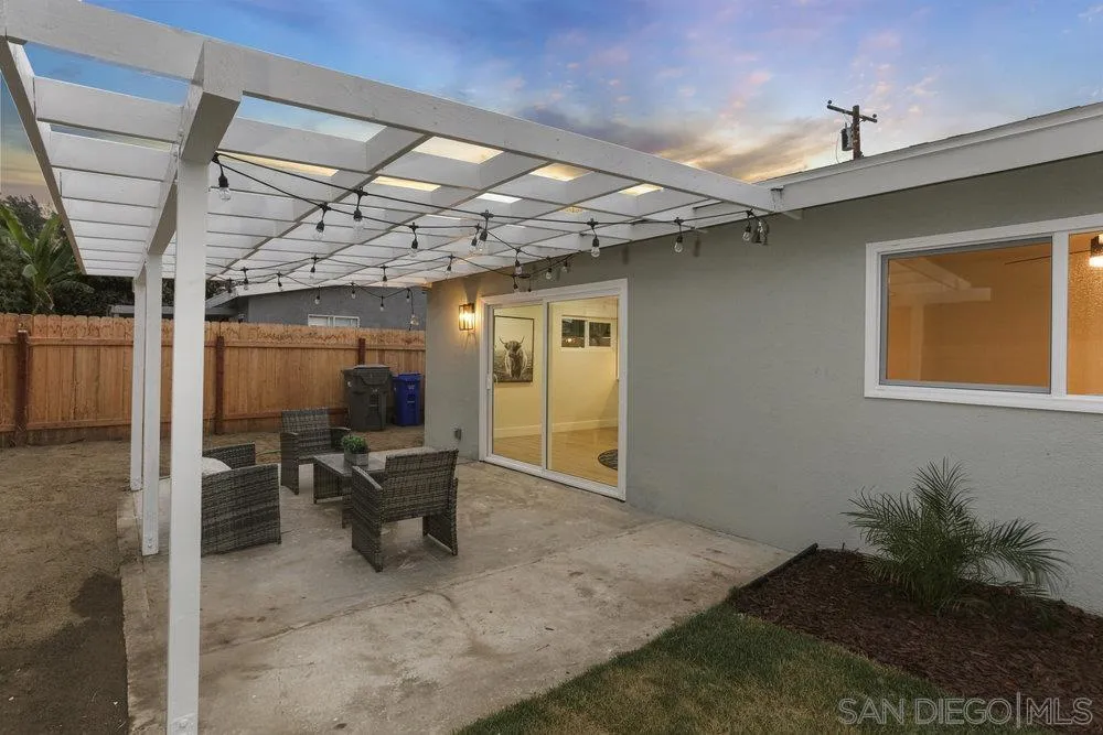 3255 Roberta Lane Oceanside, CA 92054 - Photo 21 of 24 a view of a porch with a table and chairs