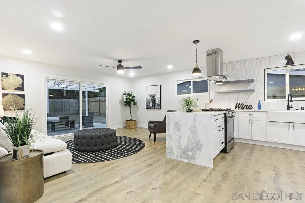 3255 Roberta Lane Oceanside, CA 92054 - Photo 4 of 24 a living room with furniture and a large window
