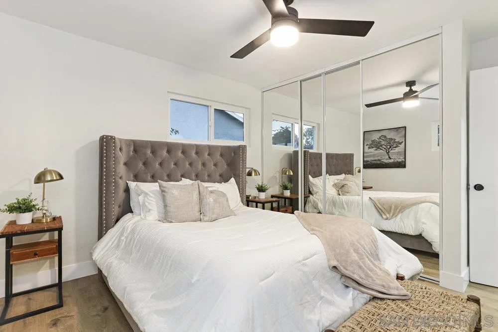 3255 Roberta Lane Oceanside, CA 92054 - Photo 9 of 24 a bedroom with double bed and a potted plant