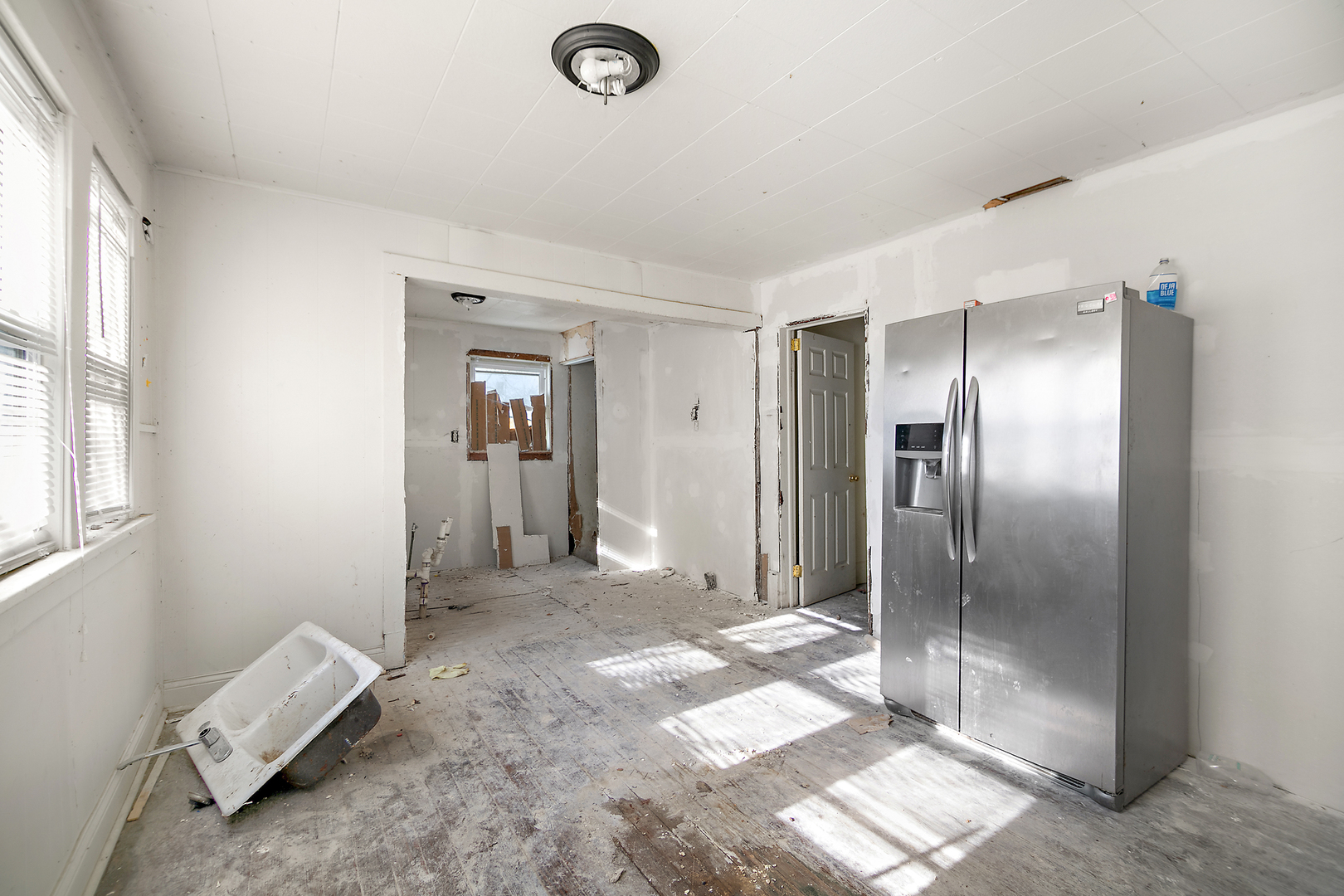 201 North Cottage Avenue Kankakee, IL 60901 - Photo 6 of 13 a view of livingroom with hardwood floor and window