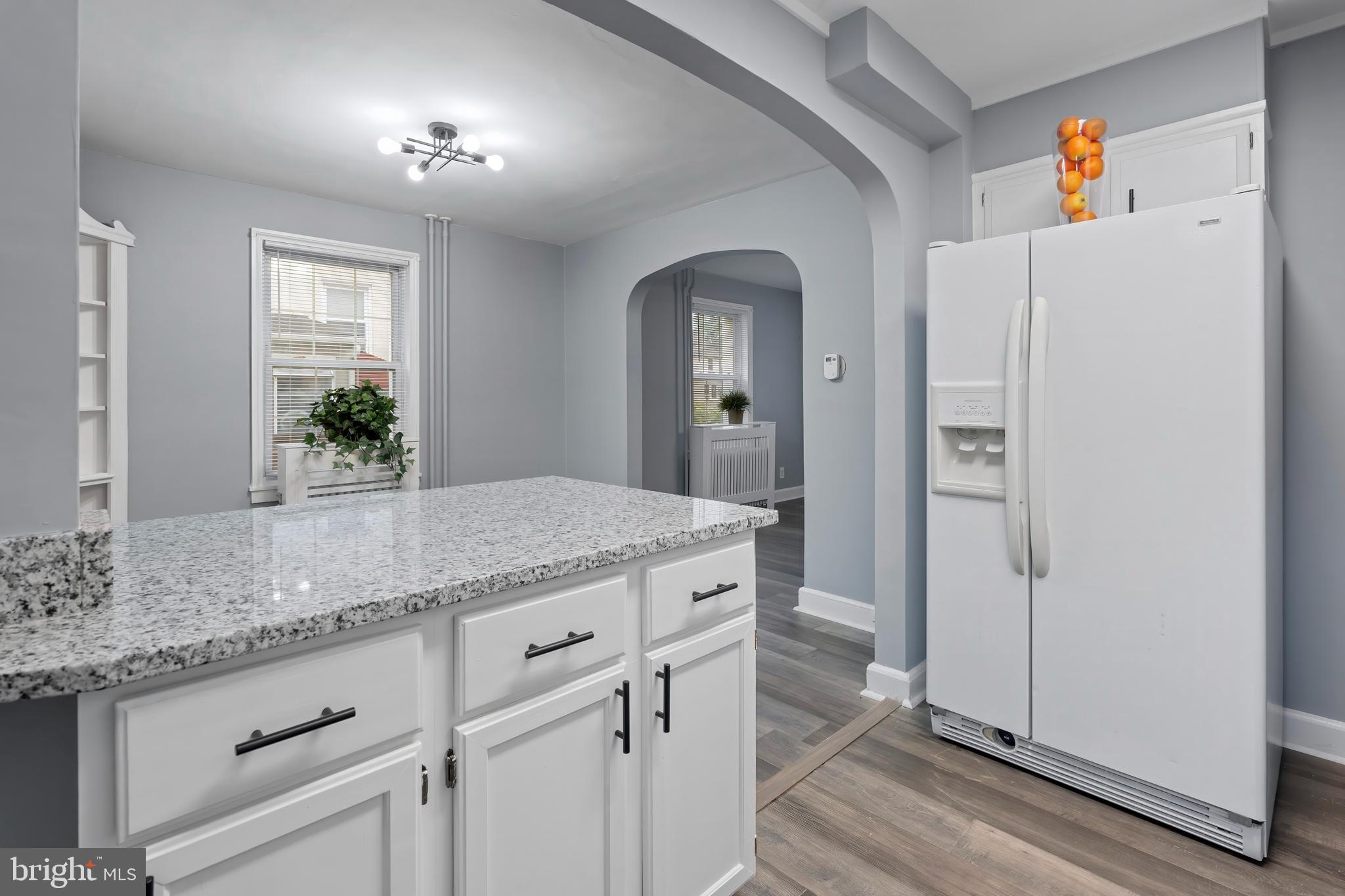 55 Kinship Road Baltimore, MD 21222 - Photo 14 of 42 a bathroom with a granite countertop sink and a mirror