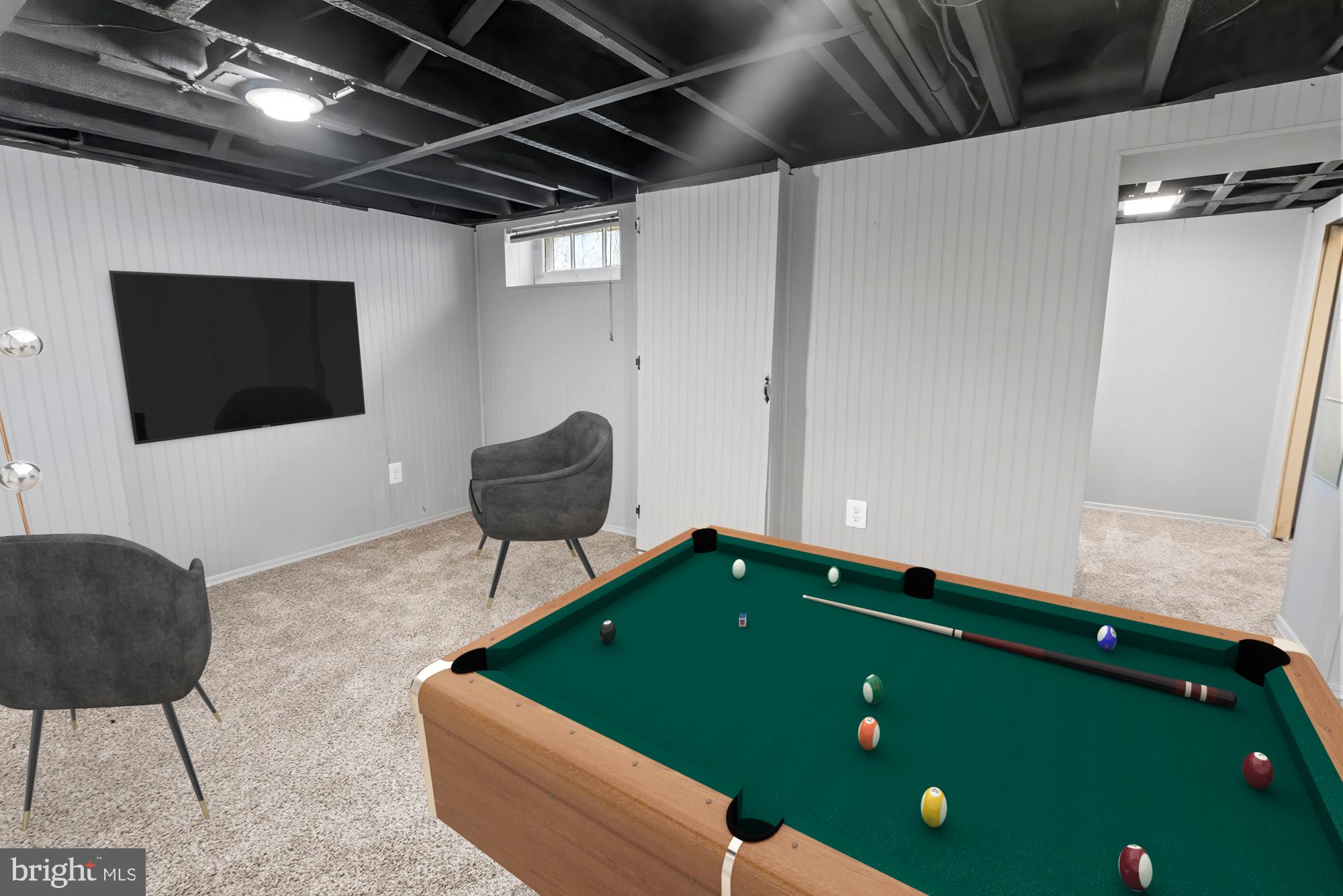 55 Kinship Road Baltimore, MD 21222 - Photo 34 of 42 a room with pool table and a flat screen tv