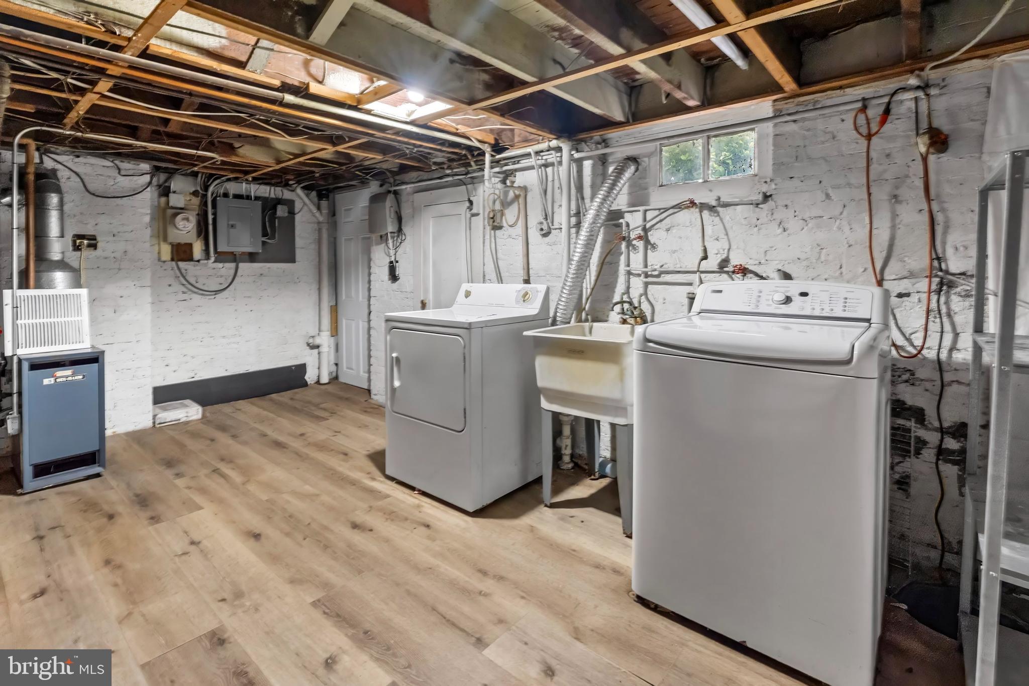 55 Kinship Road Baltimore, MD 21222 - Photo 36 of 42 a utility room with dryer and washer