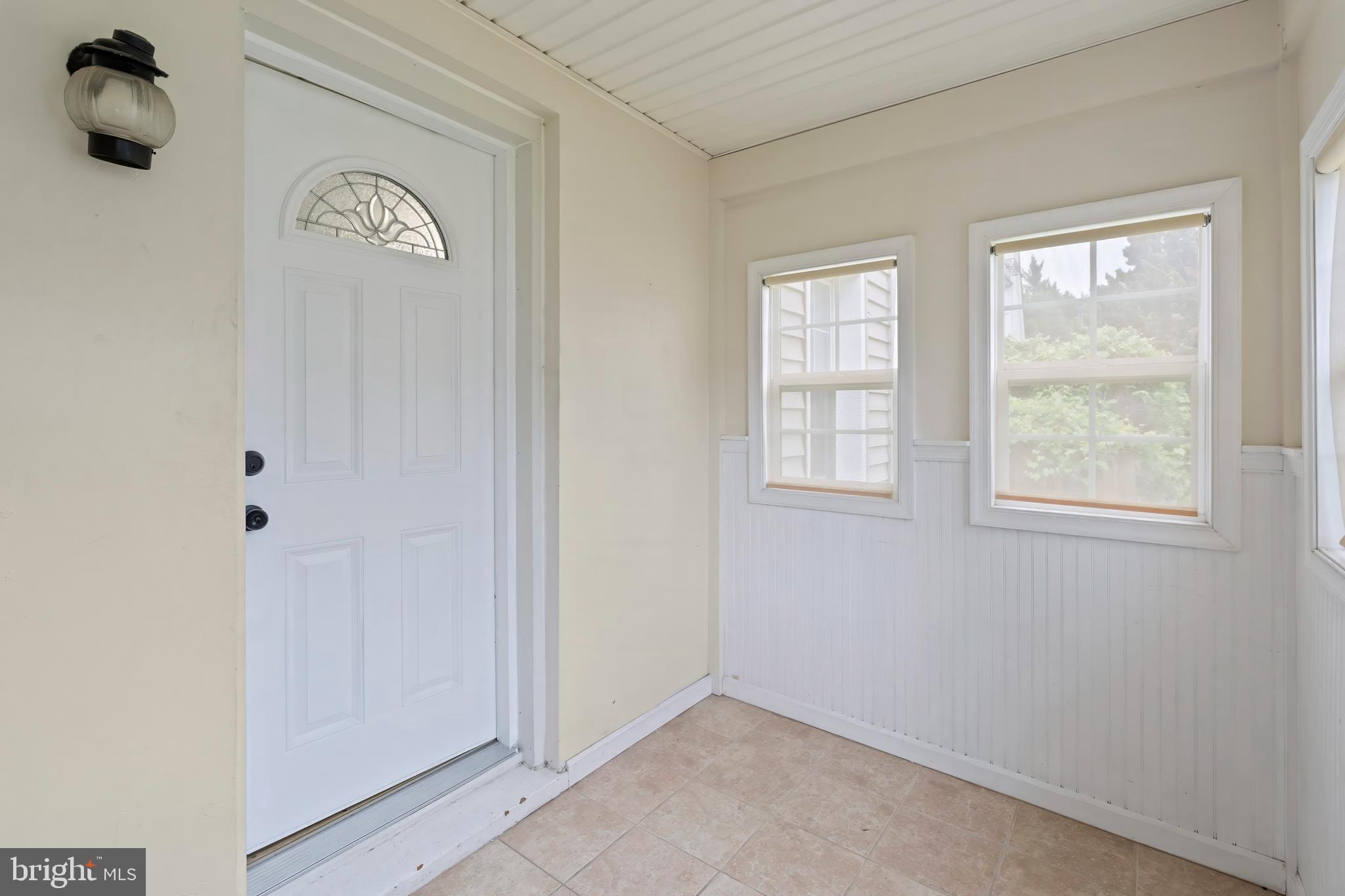 55 Kinship Road Baltimore, MD 21222 - Photo 5 of 42 an empty room with a window