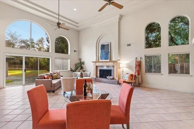 a bedroom with a bed a couch and a window