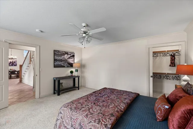 a spacious bathroom with a double vanity sink and a mirror