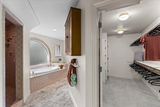 a front view of a house with a yard garage and outdoor seating