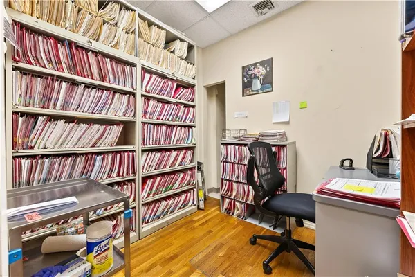 a view of a workspace with furniture