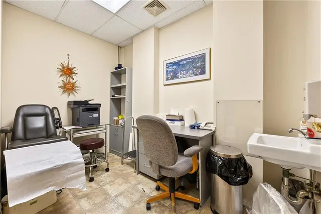 a view of a workspace with furniture and toys