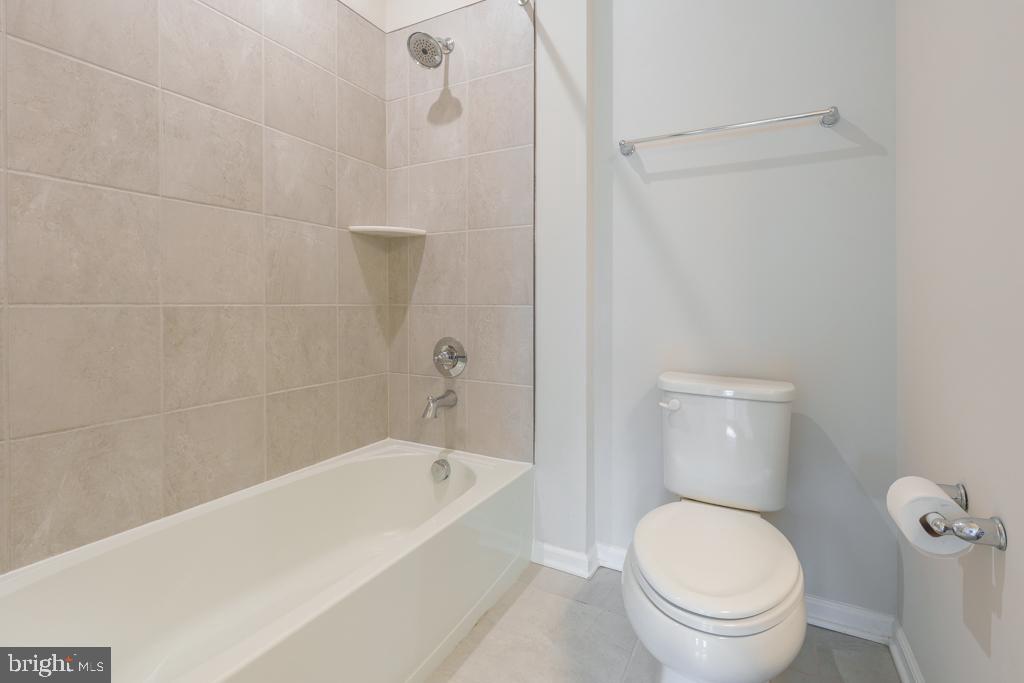 39 Sidney Lane Stratford, NJ 08084 - Photo 11 of 21 a bathroom with a toilet and bathtub