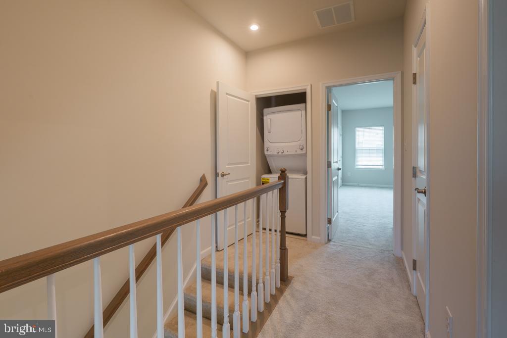 39 Sidney Lane Stratford, NJ 08084 - Photo 13 of 21 a view of a hallway with wooden floor and entryway