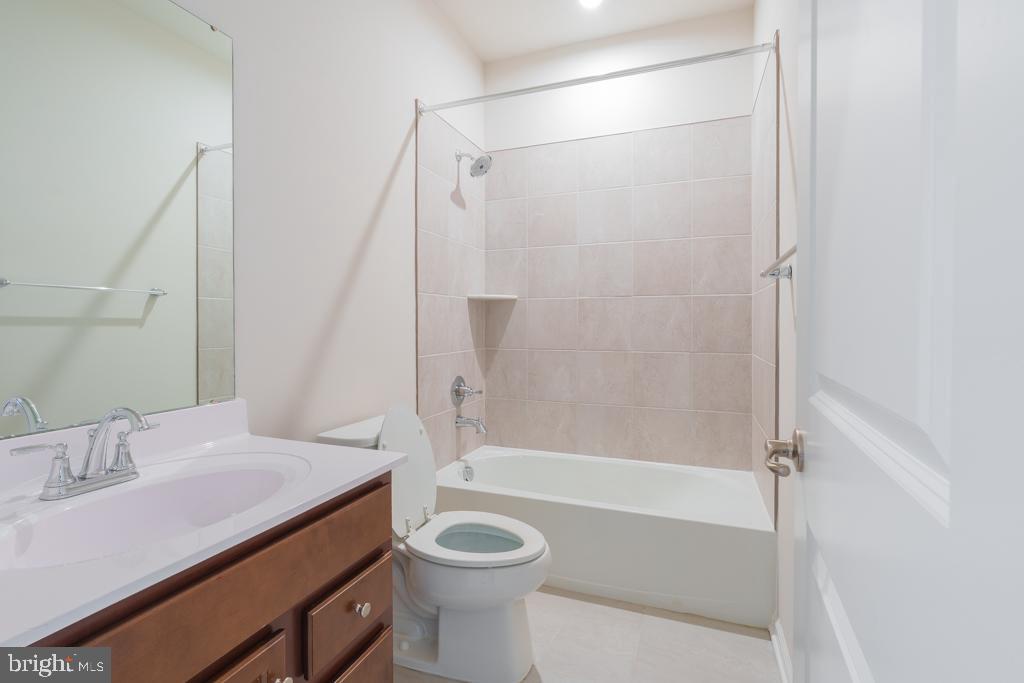 39 Sidney Lane Stratford, NJ 08084 - Photo 16 of 21 a bathroom with a sink a toilet and a bathtub