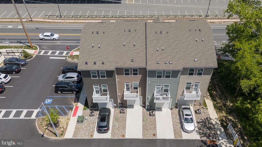 39 Sidney Lane Stratford, NJ 08084 - Photo 21 of 21 a front view of a building with outdoor seating