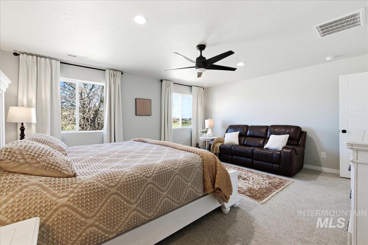 5392 South Memory Way Meridian, ID 83642 - Photo 22 of 39 Carpeted bedroom featuring recessed lighting and ceiling fan