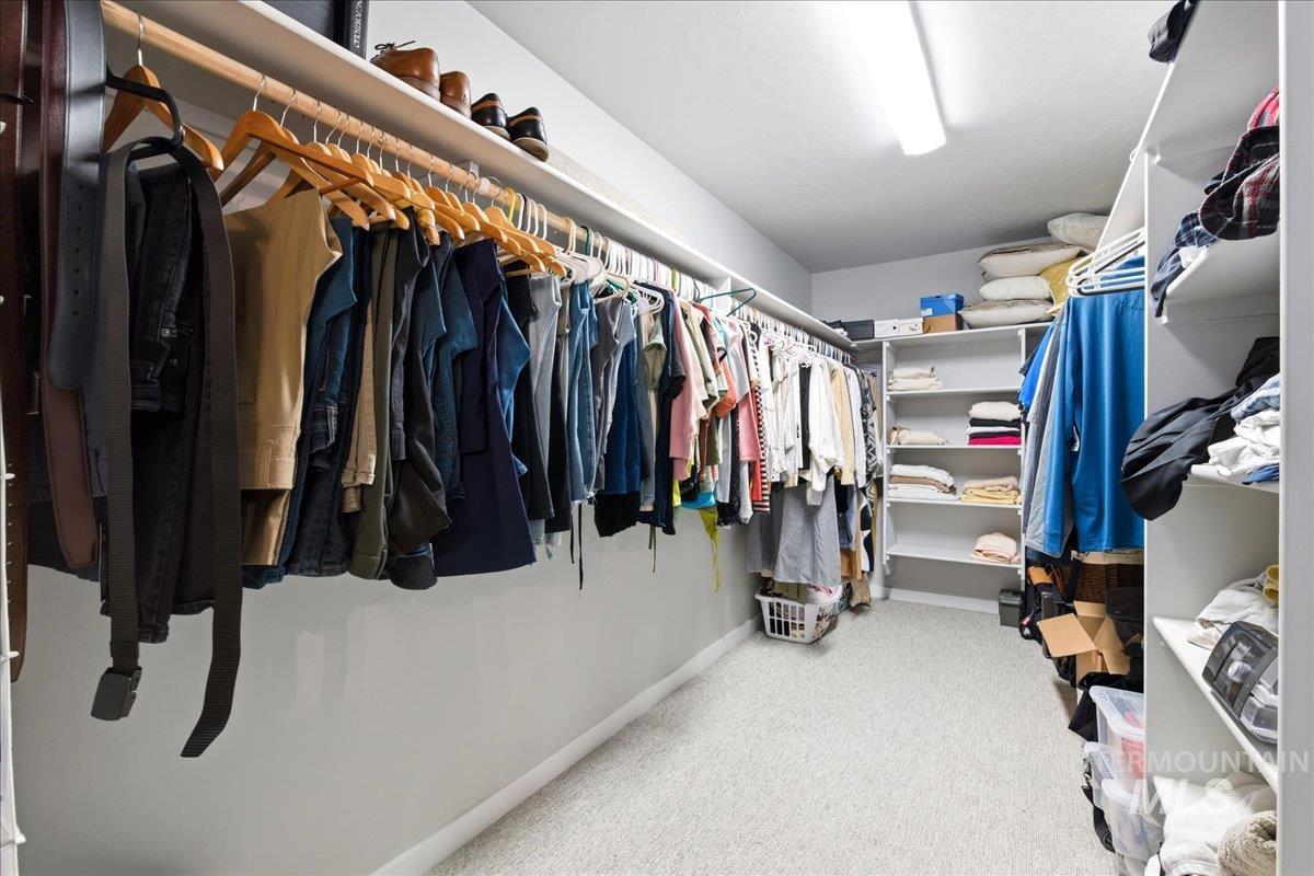 5392 South Memory Way Meridian, ID 83642 - Photo 25 of 39 Walk in closet featuring light carpet