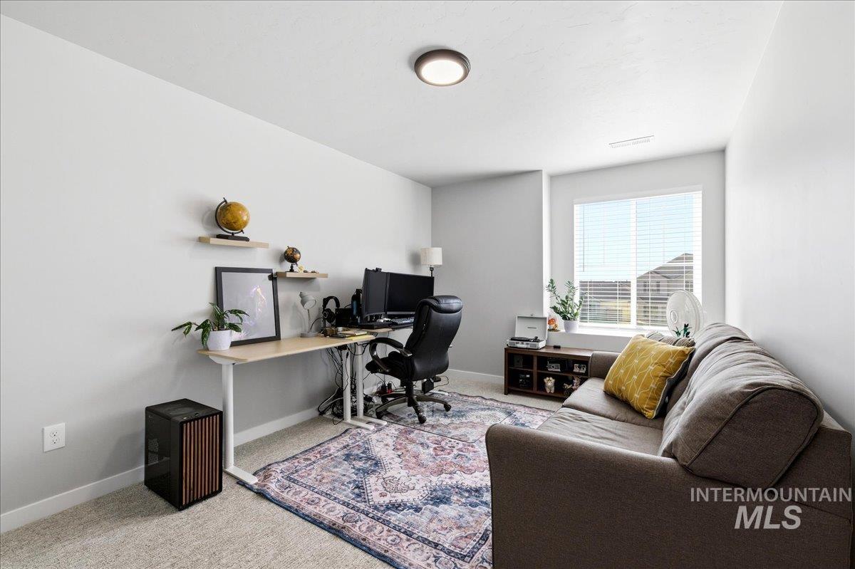 5392 South Memory Way Meridian, ID 83642 - Photo 26 of 39 Home office featuring light colored carpet and baseboards