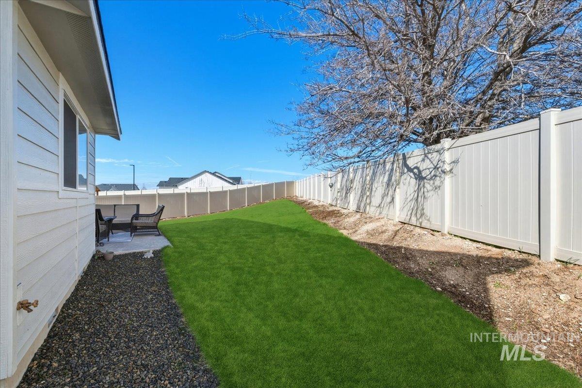 5392 South Memory Way Meridian, ID 83642 - Photo 33 of 39 Fenced backyard with a patio area
