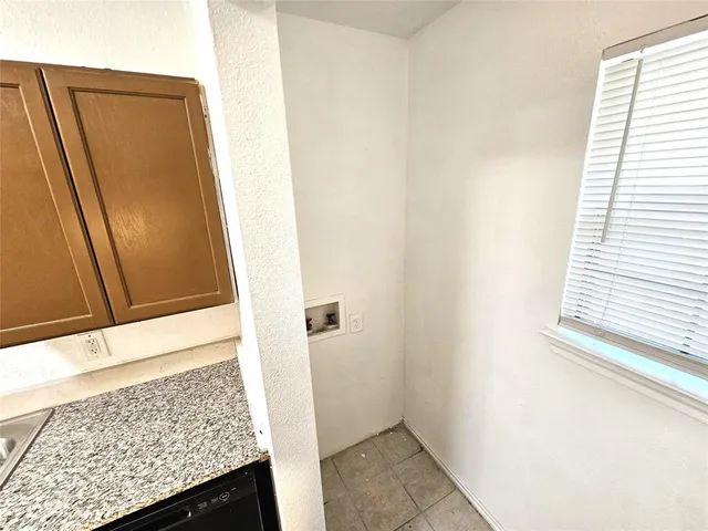 a view of a kitchen from a window