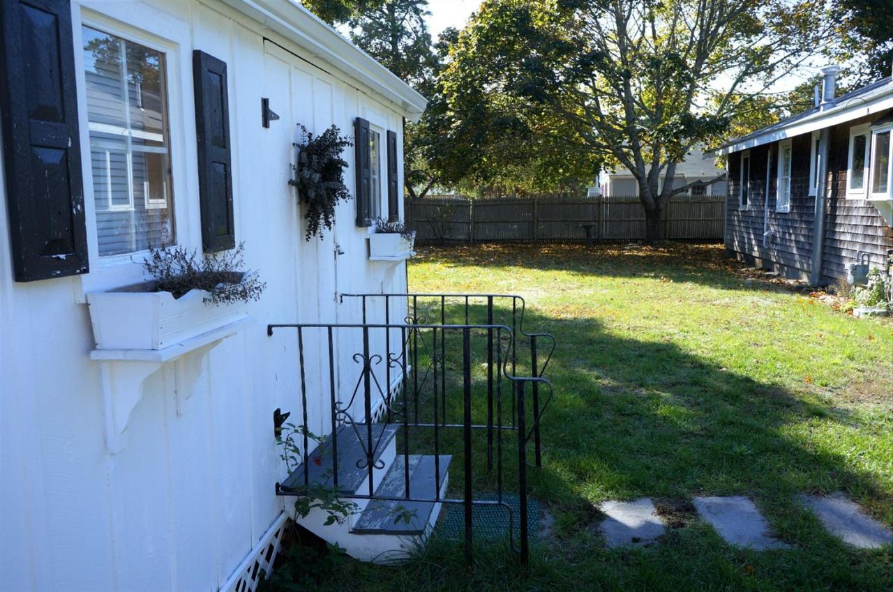 18 Edwards Road Dennis Port, MA 02639 - Photo 11 of 31 a view of swimming pool with a patio and a yard