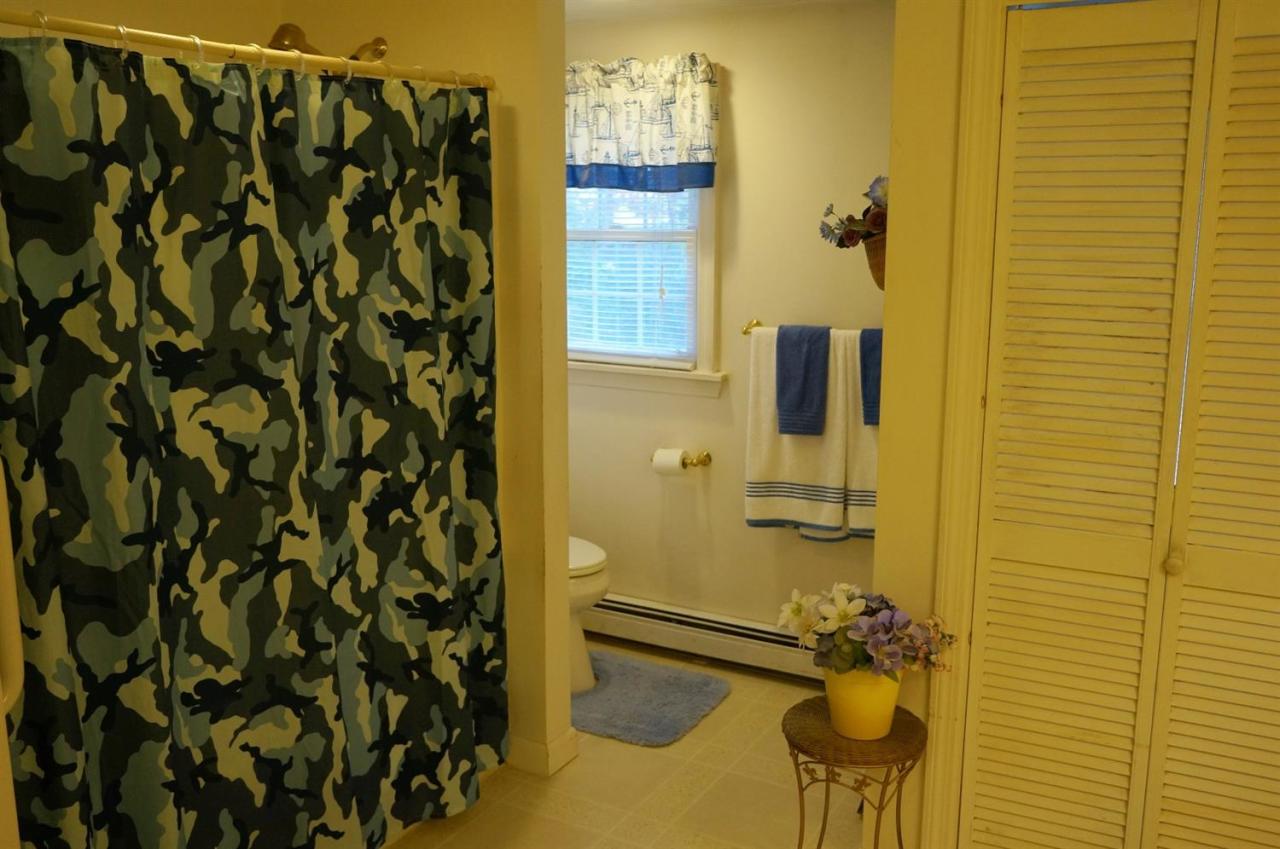 18 Edwards Road Dennis Port, MA 02639 - Photo 23 of 31 a bathroom with a shower
