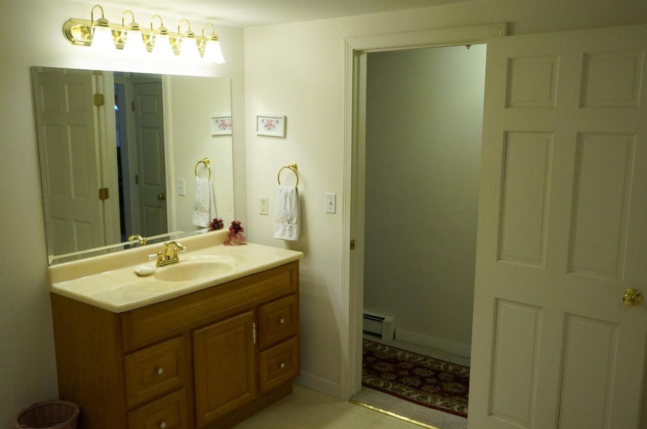 18 Edwards Road Dennis Port, MA 02639 - Photo 24 of 31 a bathroom with a sink and a mirror