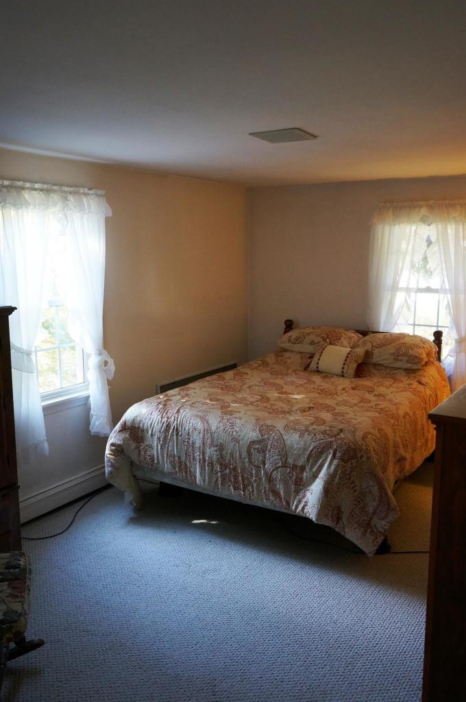 18 Edwards Road Dennis Port, MA 02639 - Photo 26 of 31 a bedroom with a bed and window