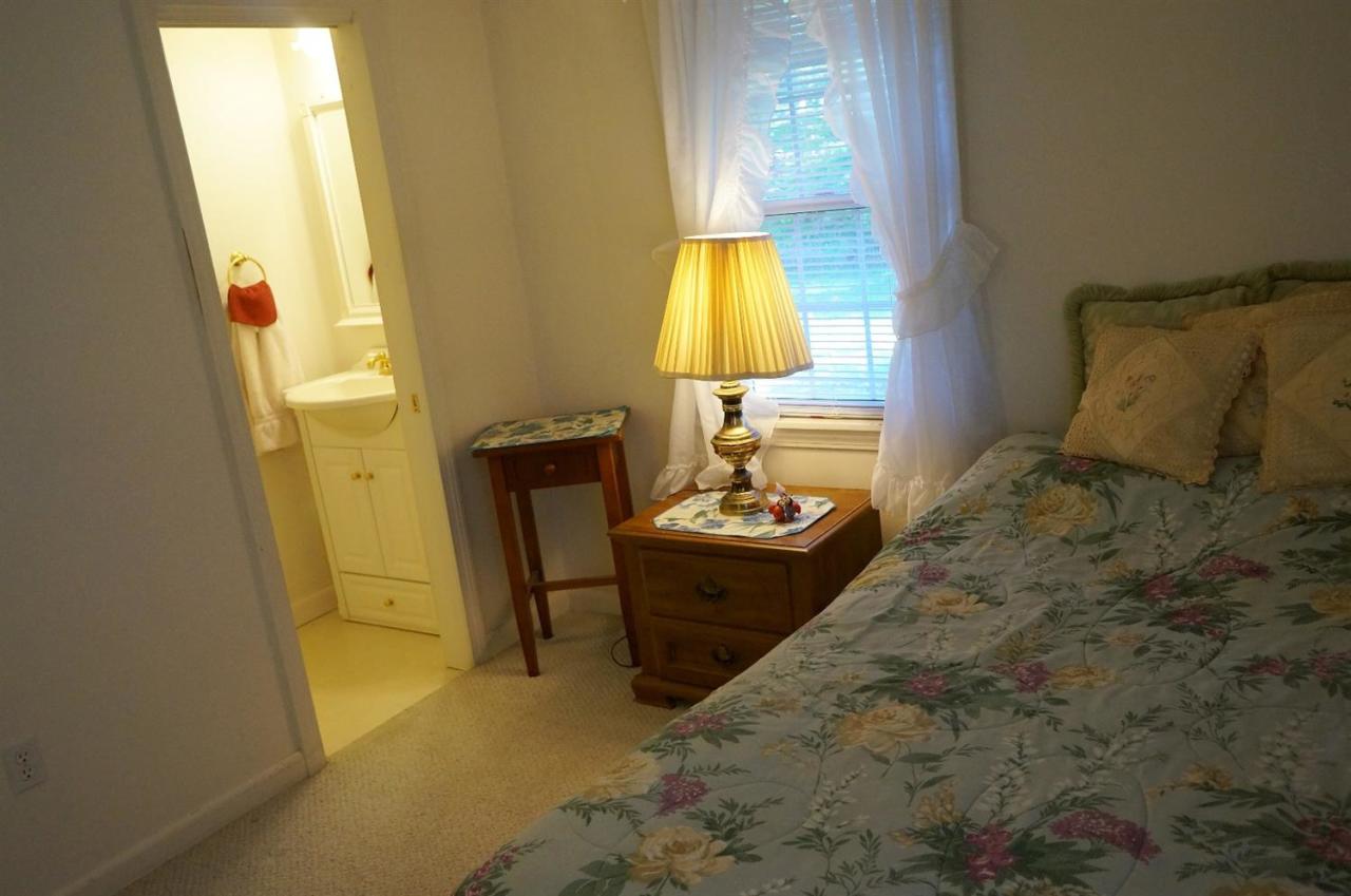 18 Edwards Road Dennis Port, MA 02639 - Photo 27 of 31 a bed room with a bed furniture and a mirror
