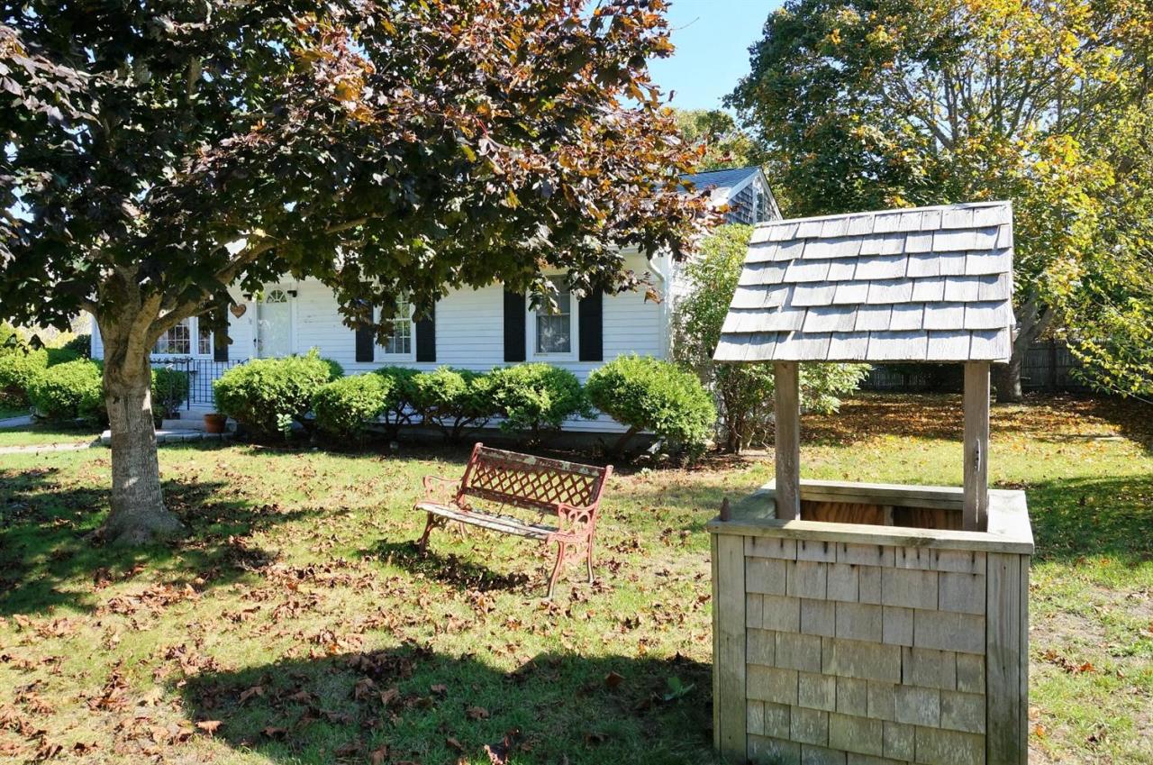 18 Edwards Road Dennis Port, MA 02639 - Photo 4 of 31 a front view of a house with a yard