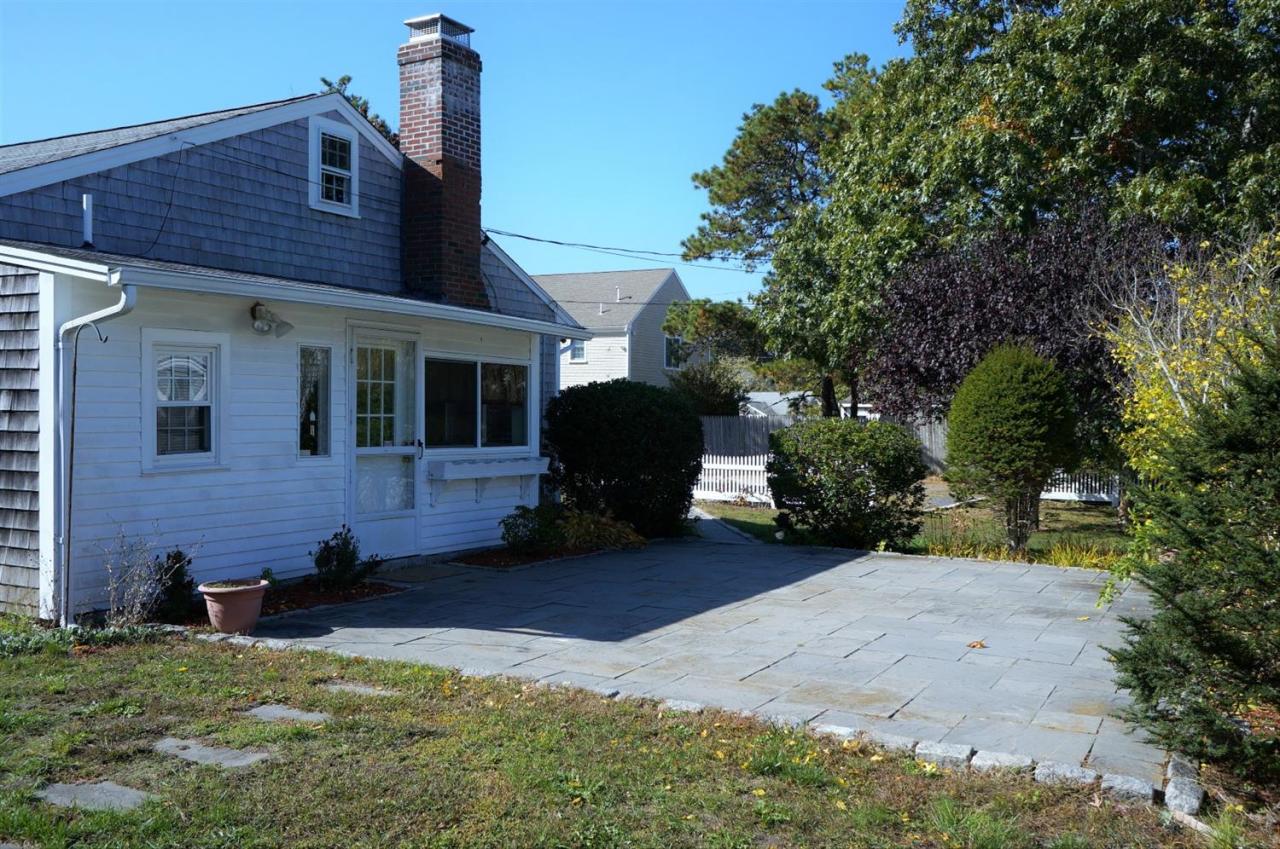 18 Edwards Road Dennis Port, MA 02639 - Photo 10 of 31 a view of a house with a yard