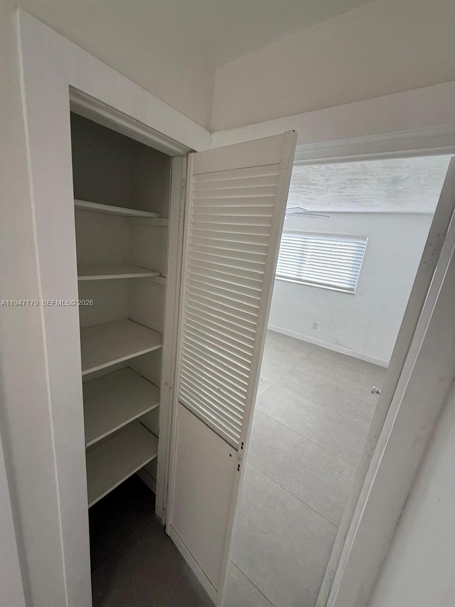 6891 Scott Street Hollywood, FL 33024 - Photo 11 of 28 a view of an empty walk in closet