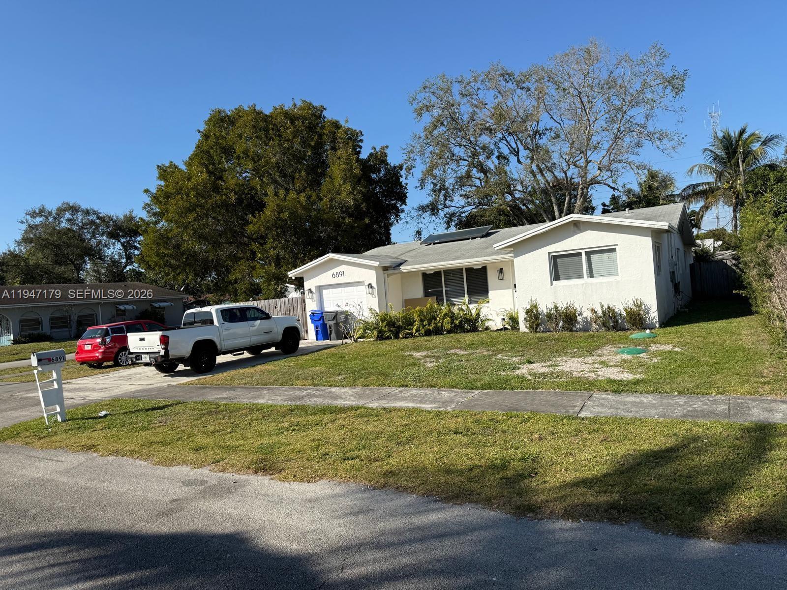 6891 Scott Street Hollywood, FL 33024 - Photo 28 of 28 a view of a house with backyard