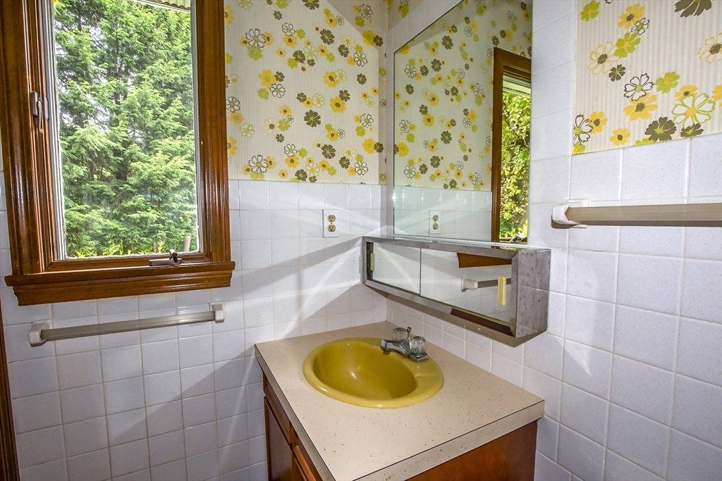54 Pequot Road Southampton, MA 01073 - Photo 24 of 32 a bathroom with a sink and a bathtub
