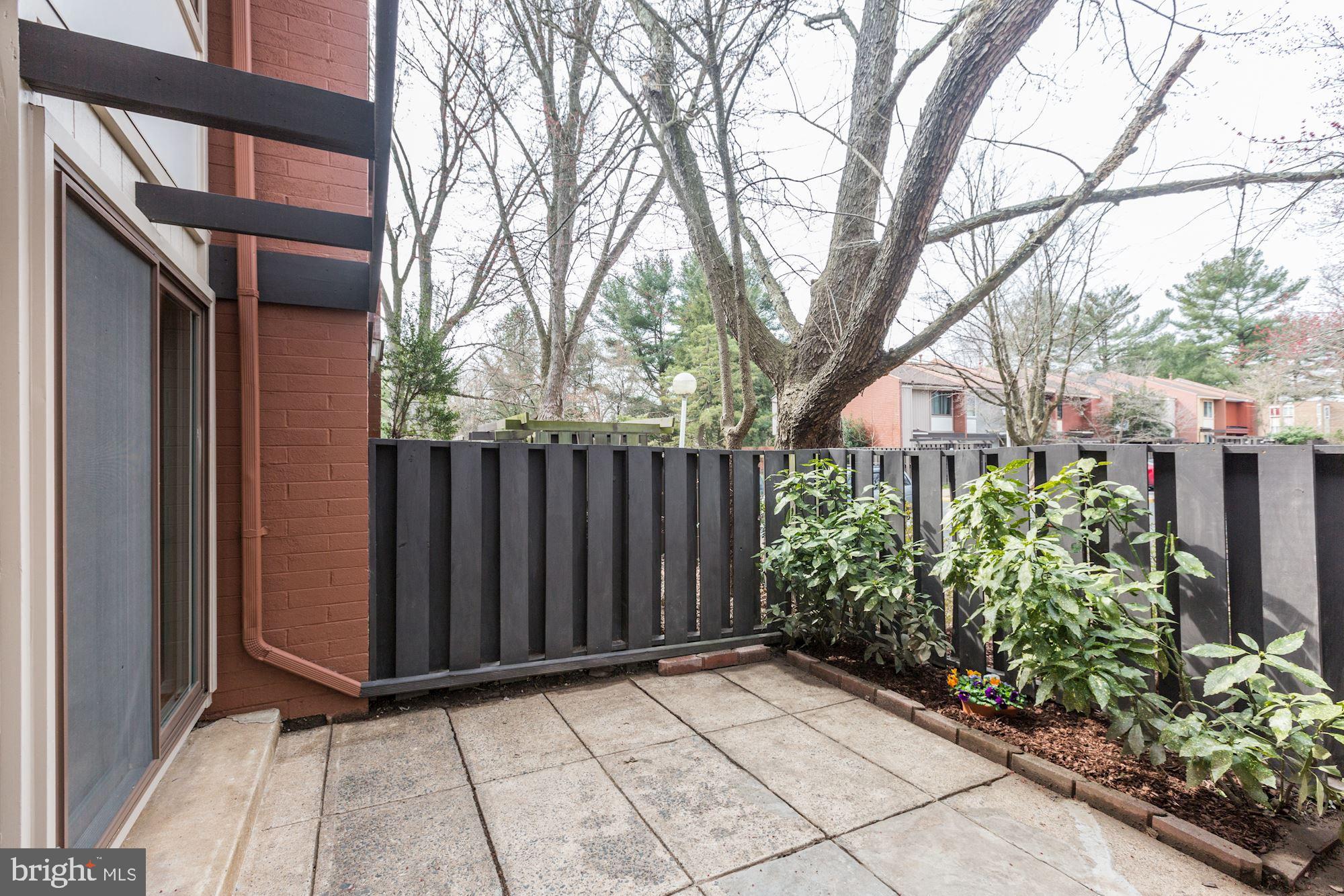1383 Northgate Square Reston, VA 20190 - Photo 2 of 30 PRIVATE FRONT PATIO AND PERHAPS AN HERB GARDEN?