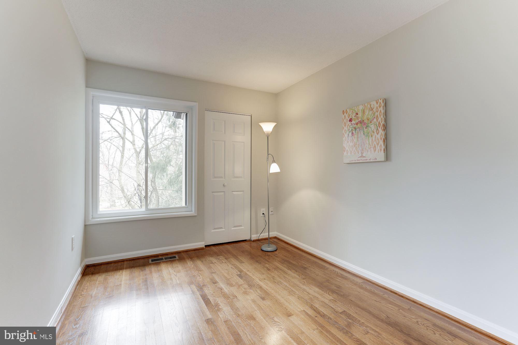 1383 Northgate Square Reston, VA 20190 - Photo 21 of 30 HARDWOOD FLOORING IN 2ND BEDROOM & UPPER LEVEL