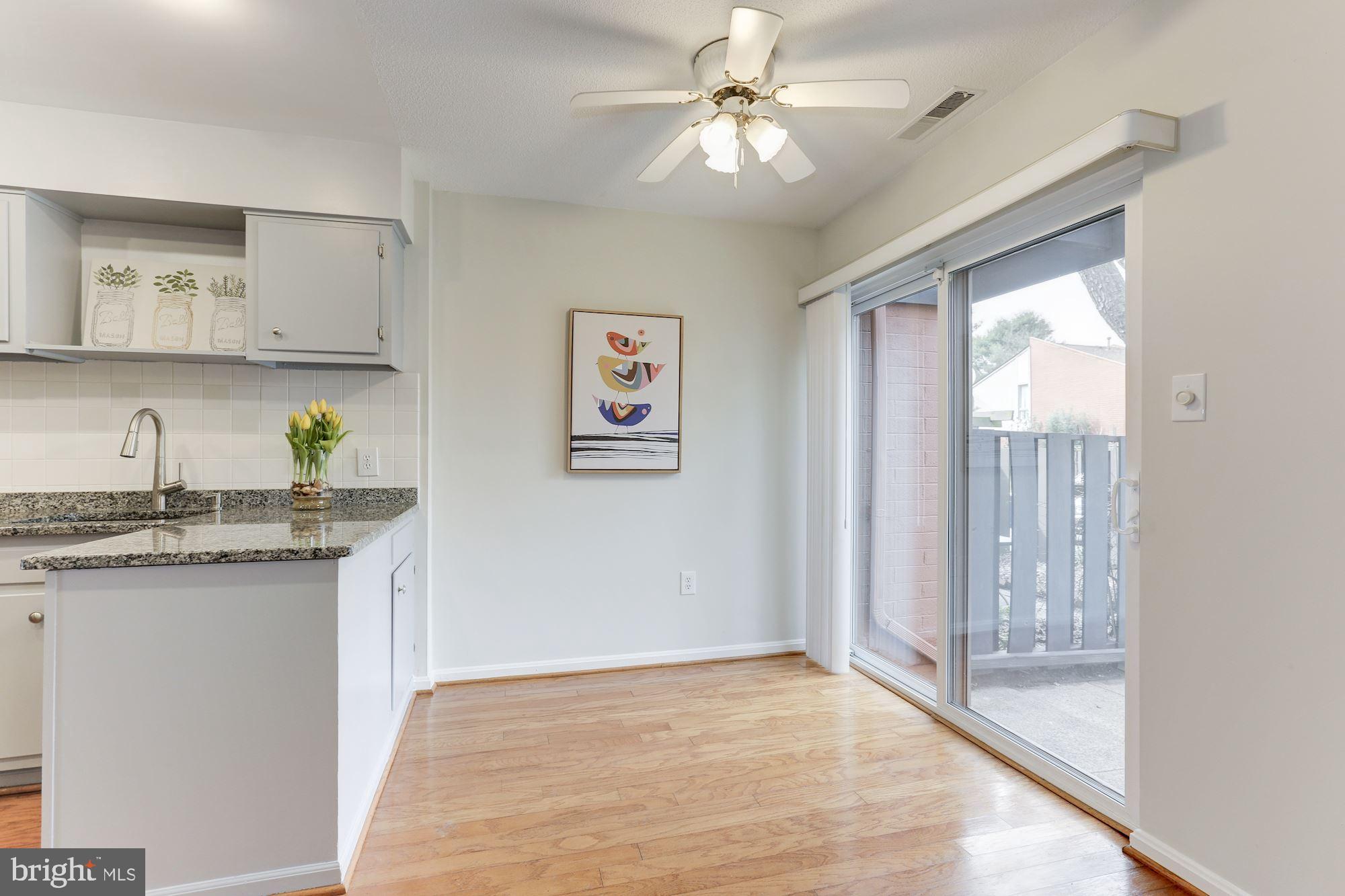 1383 Northgate Square Reston, VA 20190 - Photo 9 of 30 DINING AREA W/LIGHT AND FAN