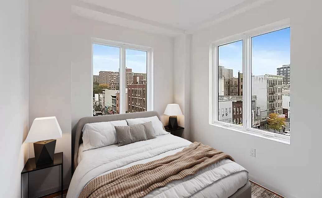 65 Graham Avenue, Unit 6A Brooklyn, NY 11206 - Photo 4 of 5 a bedroom with a bed and a window