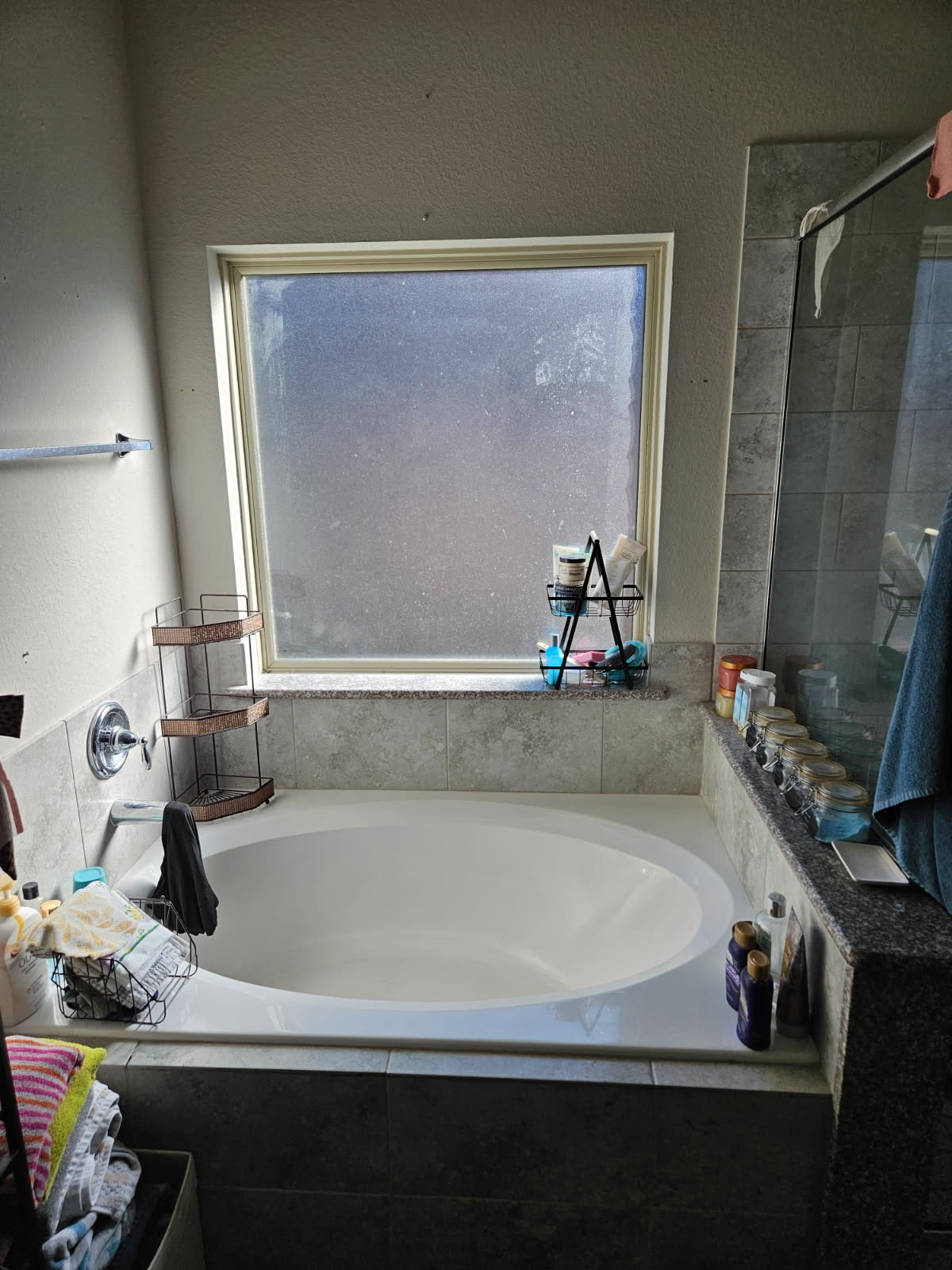 5710 Micah Lane Rosenberg, TX 77471 - Photo 11 of 36 Bathroom with bathtub, shower curtain, and vanity.