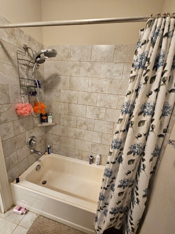 5710 Micah Lane Rosenberg, TX 77471 - Photo 12 of 36 Shower/tub combo with tiled walls and curtain.