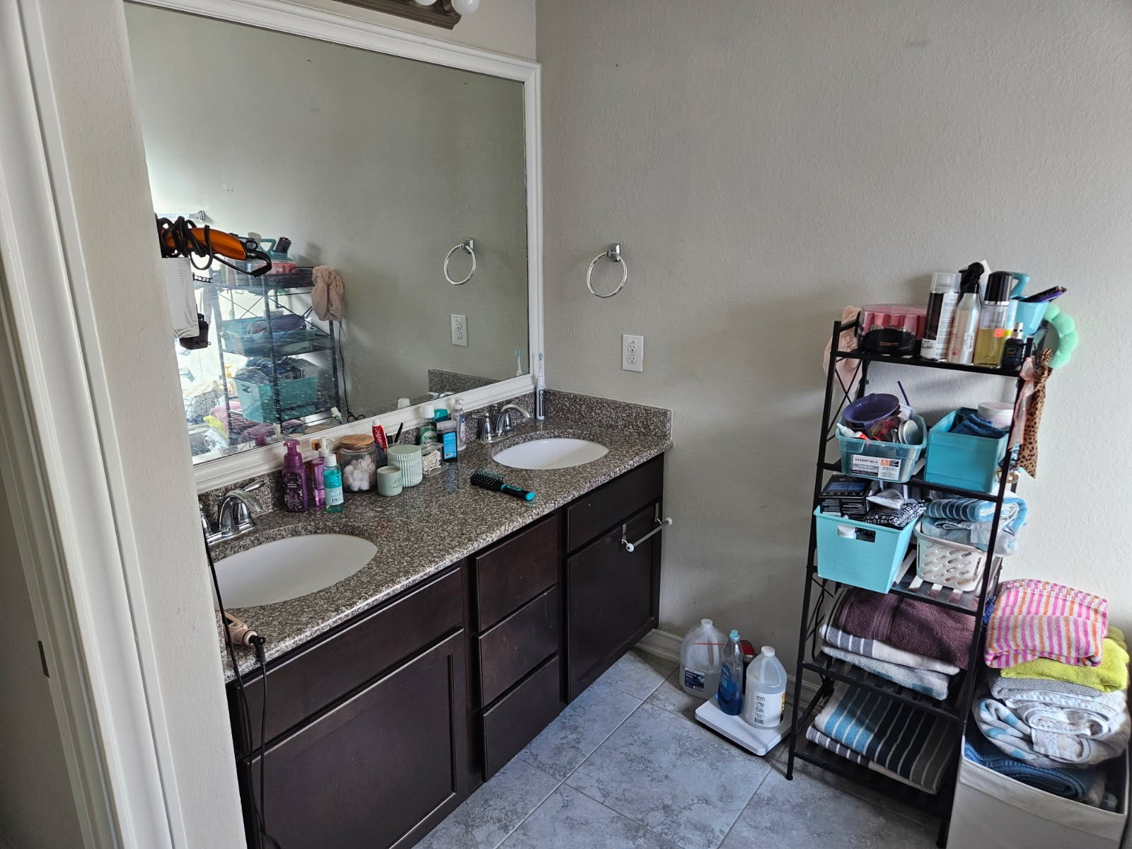 5710 Micah Lane Rosenberg, TX 77471 - Photo 14 of 36 Bathroom with vanity, mirror, and personal storage items.