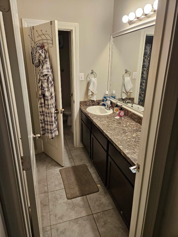 5710 Micah Lane Rosenberg, TX 77471 - Photo 16 of 36 Bathroom vanity with mirror and lighting.