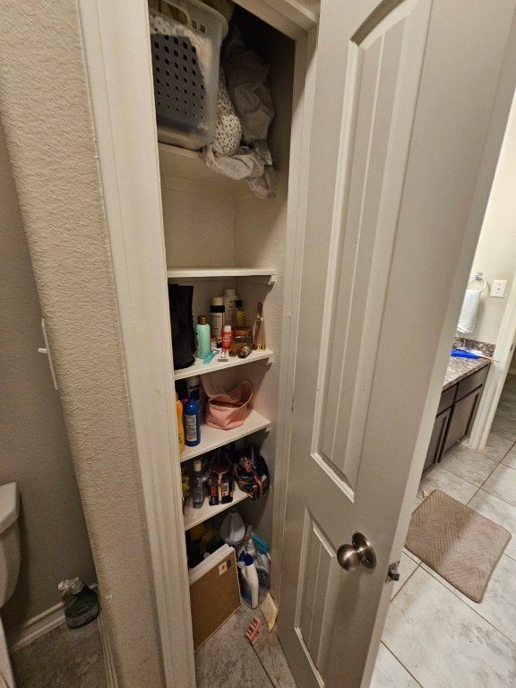 5710 Micah Lane Rosenberg, TX 77471 - Photo 17 of 36 Pantry or storage closet with built-in shelving.