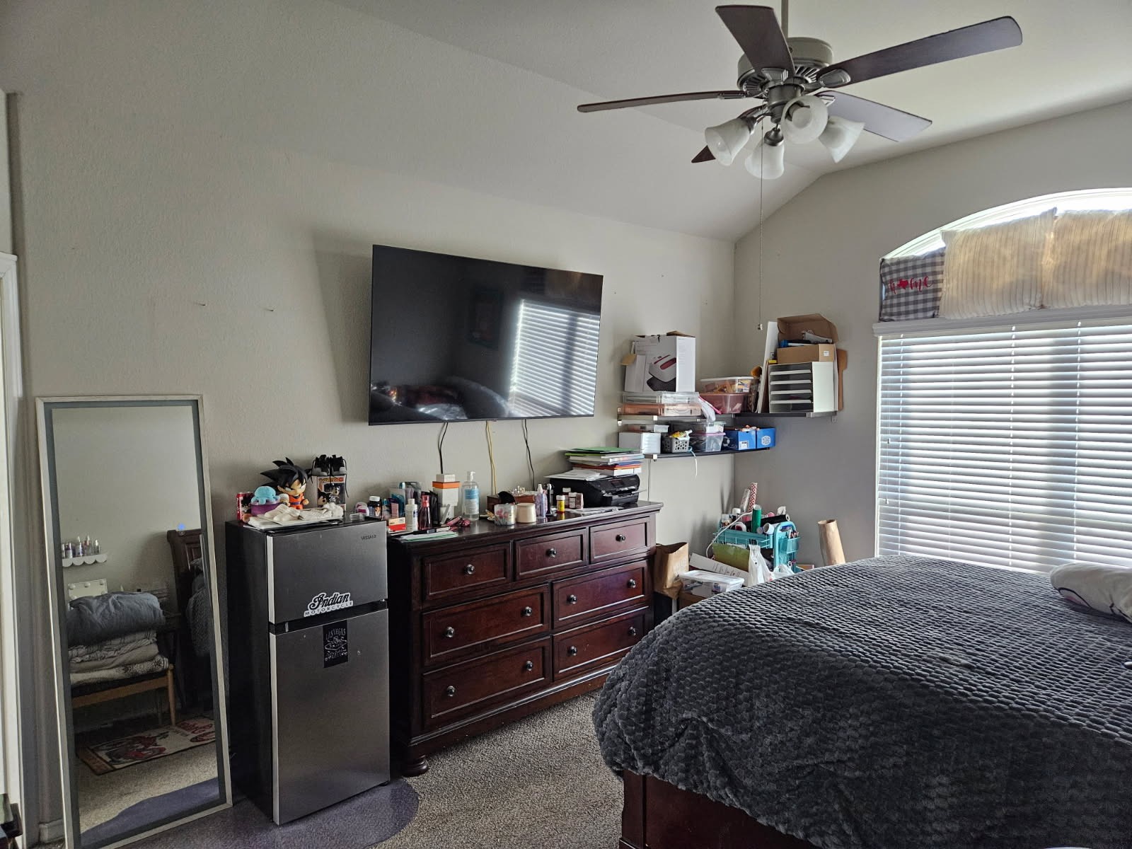 5710 Micah Lane Rosenberg, TX 77471 - Photo 19 of 36 Bedroom with ceiling fan, dresser, and natural light.