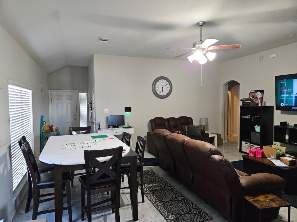 5710 Micah Lane Rosenberg, TX 77471 - Photo 3 of 36 Bright, open-concept living area perfect for entertaining. The space seamlessly connects the dining area to a comfortable lounge